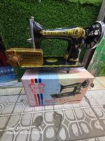 Butterfly domestic sewing machine head